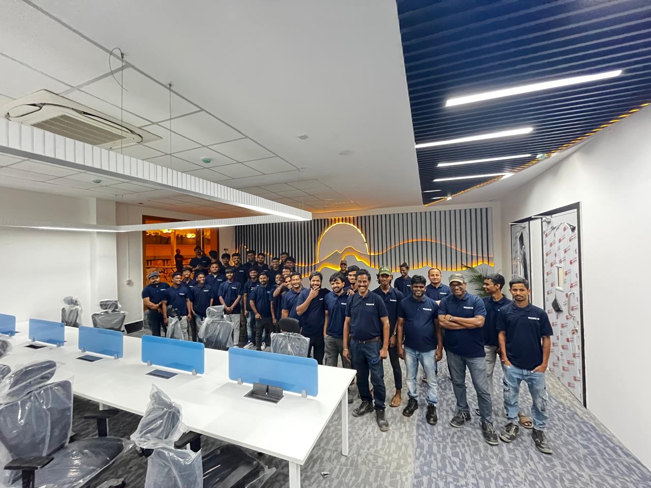 Voomet team group photo inside a newly delivered workspace